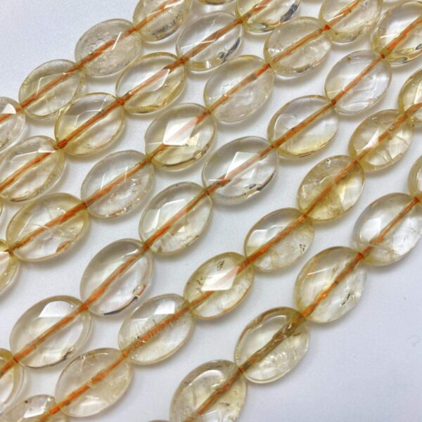 citrine 0611 ab faceted oval 10x14mm