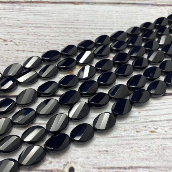 onyx 0507 faceted twist oval 10x14mm