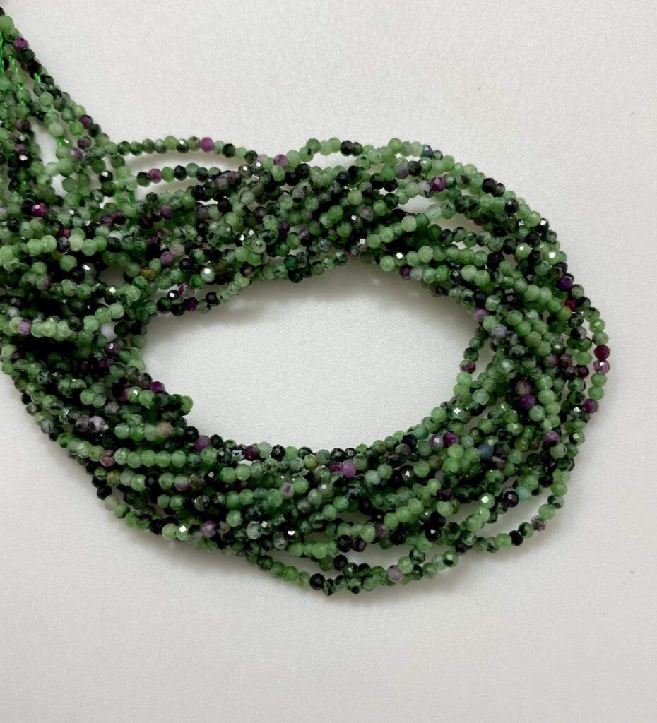 ruby zoisite 0811 faceted round 2mm